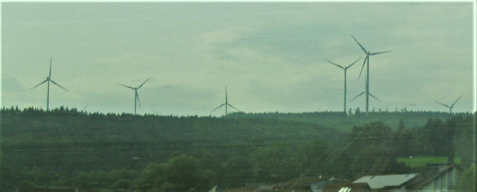 A Group of Windmills on a Ridge