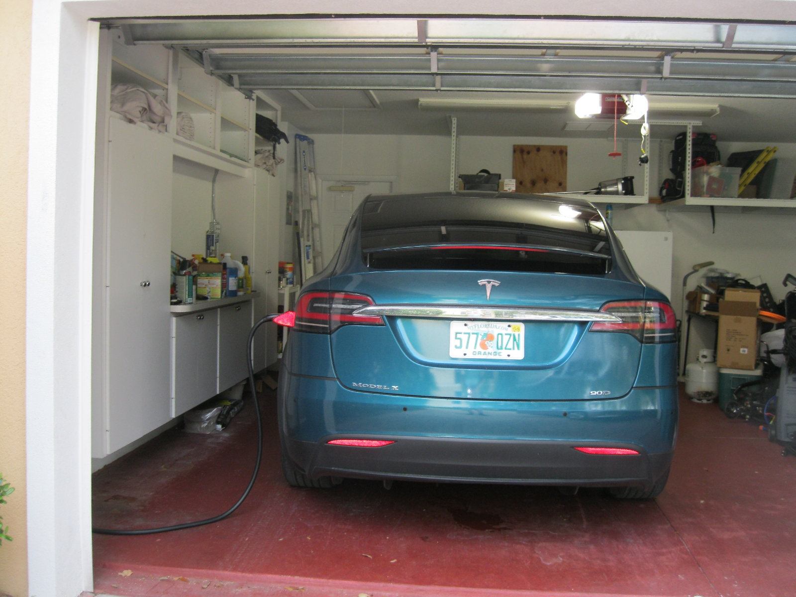 Tesla feeding in the garage